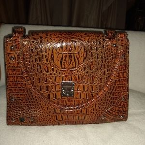 Diva Collection mock croc embossed bag.